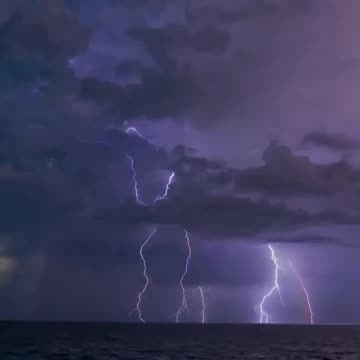 Rainbow Clash Over Silent Waves.