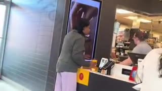 Woman on camera hurls hot coffee on McDonald's manager
