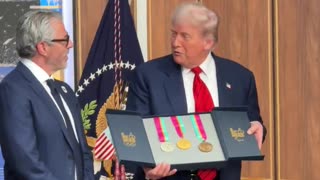 Casey Wasserman presents President Donald J. Trump with a complete set of the original 84 Olympic medals.