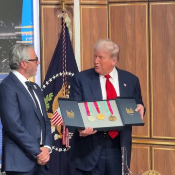 Casey Wasserman presents President Donald J. Trump with a complete set of the original 84 Olympic medals.