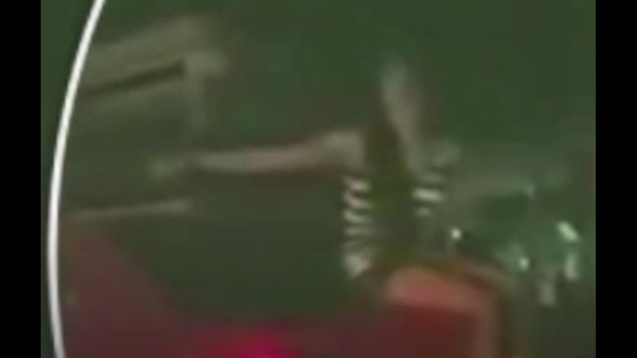 Ghostly girl' sitting on top of moving car