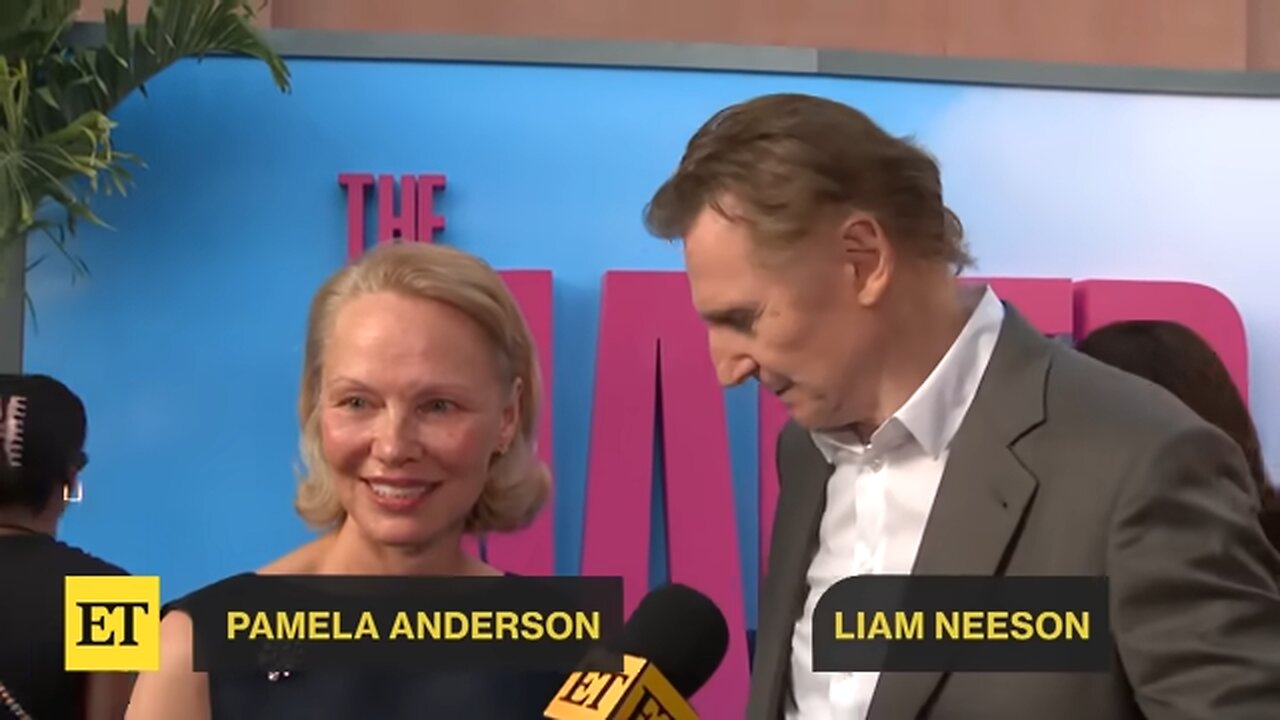 Pamela Anderson and Liam Neeson NEARLY KISS Mid-Interview (Exclusive)