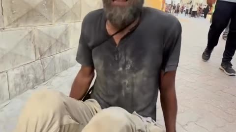 This man took his children to the Zikim area, hoping to secure a little food for his starving family
