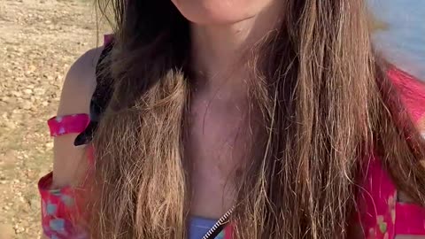 Paws and Sunshine: Tiny Pups Stroll by the Sparkling Lake!