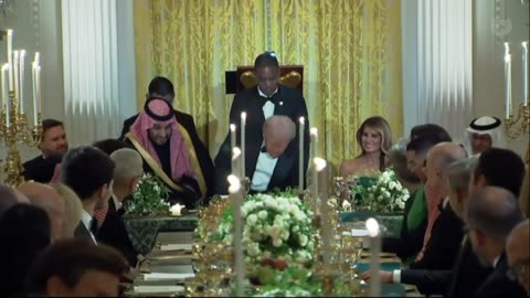 Trump and Saudi Crown Prince sit together for a candle-lit dinner at the White House.