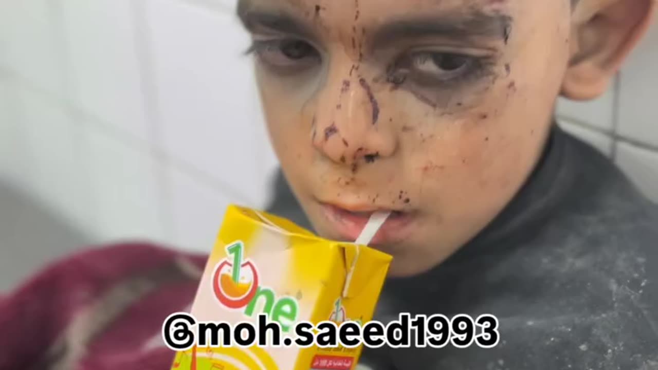 Beneath the rubble, their tiny faces emerge