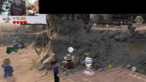 Carson gaming play Lego Jurassic world
