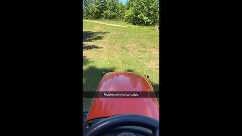 Bx2380 mowing the yard
