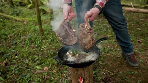 Cooked Perfect Tomahawk Steaks Over an Open Fire 2