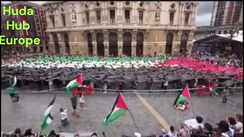 Human Mosaic of Palestinian flag at Grand week of Bilbao Spain