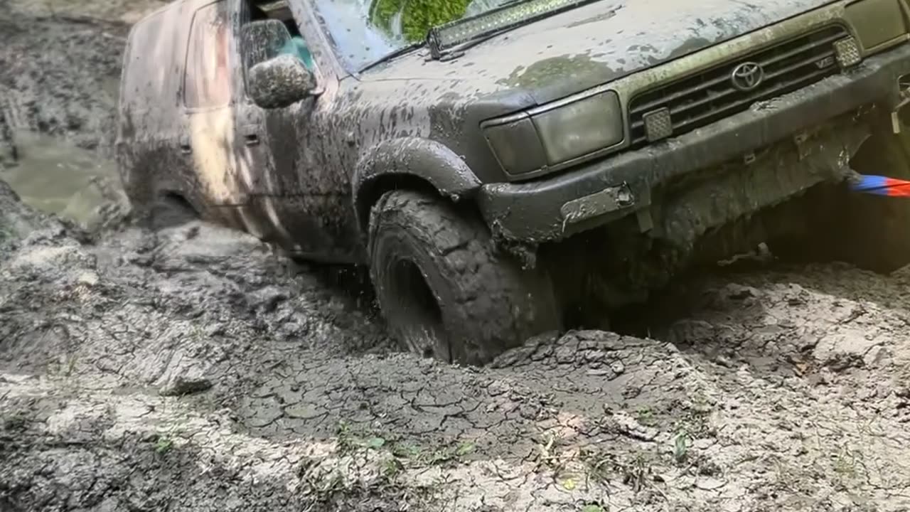 Car Pulled Out Of Deep Mud