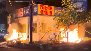 Several dead as Indonesian protesters set fire to government building