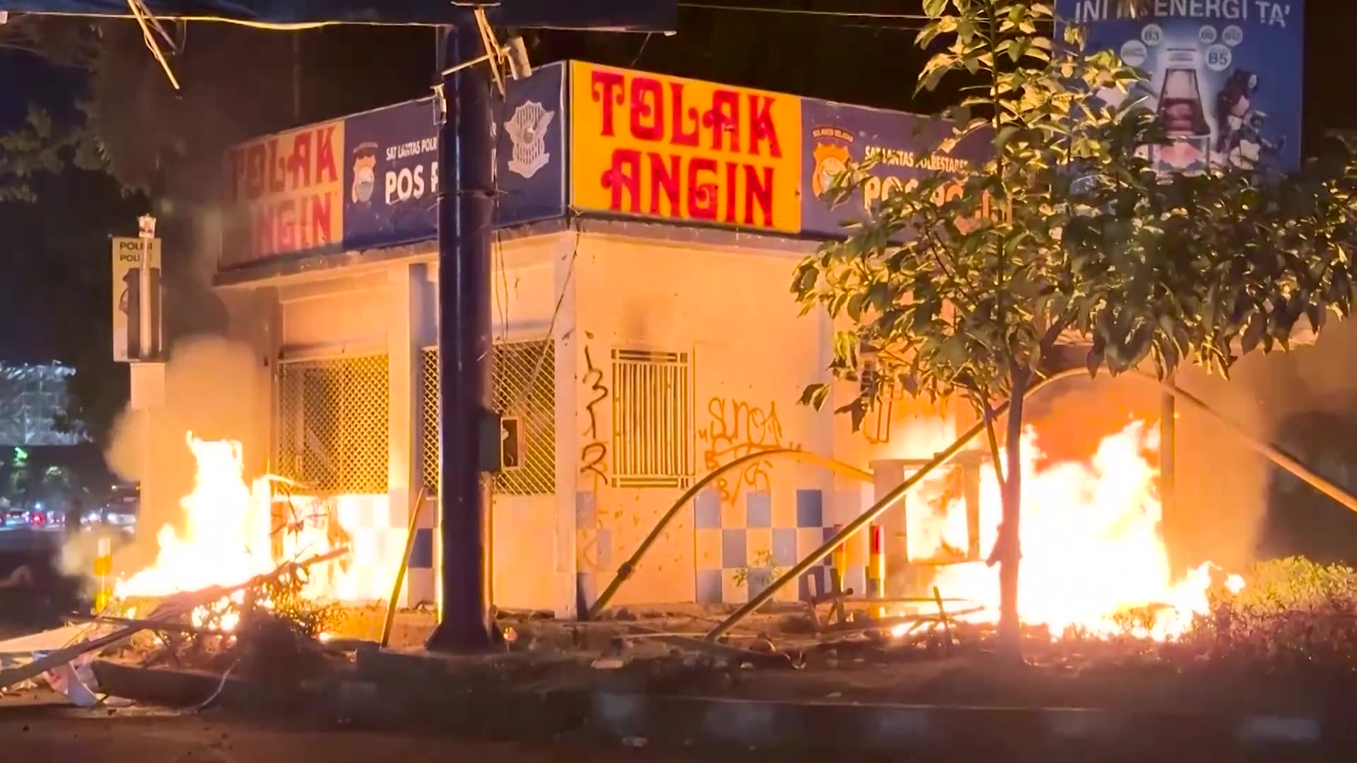 Several dead as Indonesian protesters set fire to government building