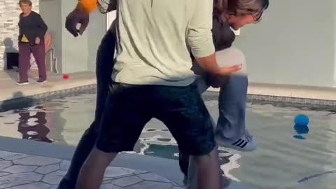 😱🏊‍♀️ She Didn't Expect This! Thrown into Pool! | FunFM