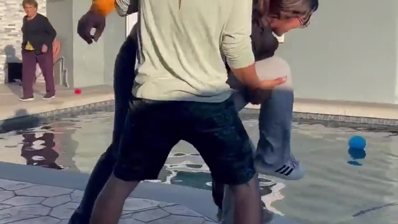 😱🏊‍♀️ She Didn't Expect This! Thrown into Pool! | FunFM