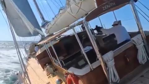 Sailboat heels sharply in mid-sail