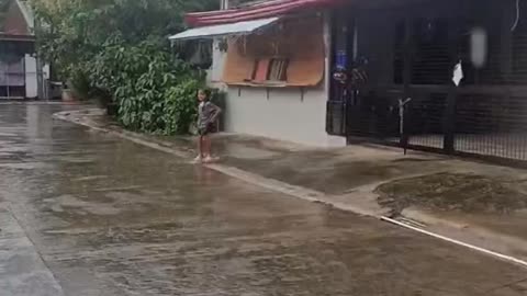 What do you do when it rains in the Philippines? You play in it of course