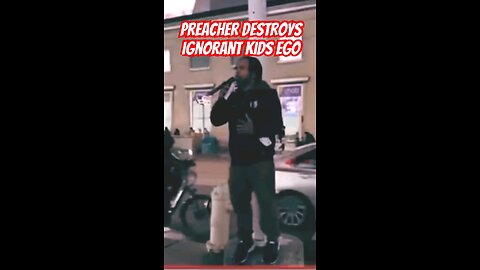 kid gets humbled after taking a a street preachers microphone