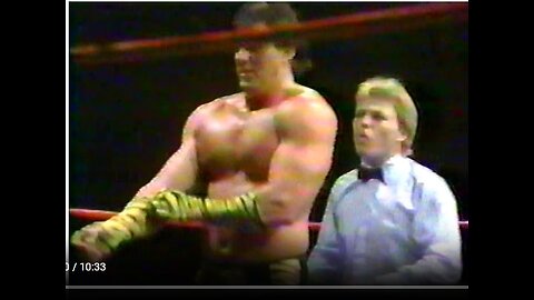 Brutus Beefcake in yellow with black striped tights/pants vs Jim-Young-1985-3-25