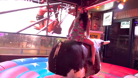 Crazy girl bull riding