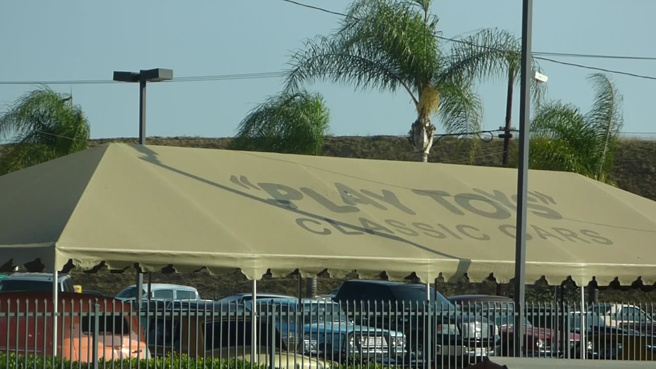 Dad points out a pretty blue truck