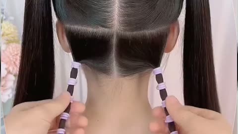 Elegant Double Braided Bun Hairstyle for Kids