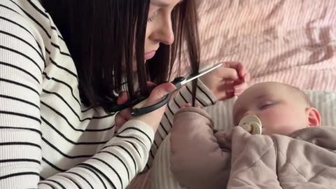Mom Cuts Hair to Avoid Waking Baby