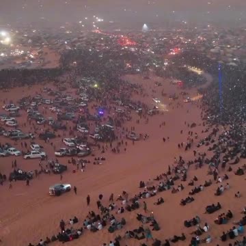 A Palestinian flag rose in the middle of the Libyan desert
