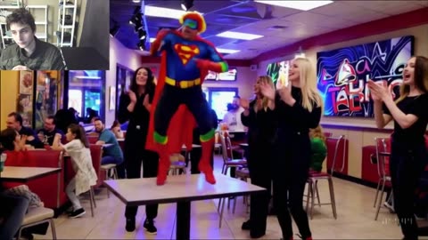 Man In A Fictitious Superhero-Inspired Costume Dancing At A Taco Bell Restaurant Fake Funny Parody