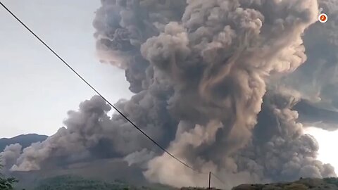 Ash covers roads and homes after Indonesian volcano erupts