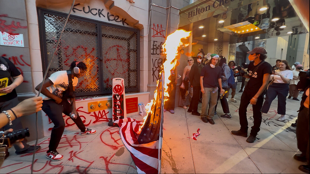 American Flag Taken Down, Set Ablaze Outside Hilton Hotel in Downtown LA