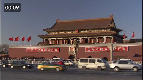 Wide Shot pan,right zoom,out , A bendy bus drives past the famous Forbidden City in Beijing, China.