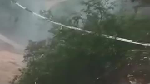 Driver hanging out in truck after bridge collapses in Guizhou, China