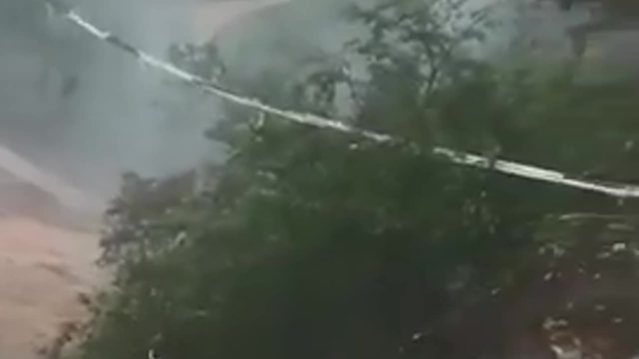 Driver hanging out in truck after bridge collapses in Guizhou, China