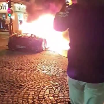 PSG fans, many North Africans, devastate Paris after victory over Arsenal.