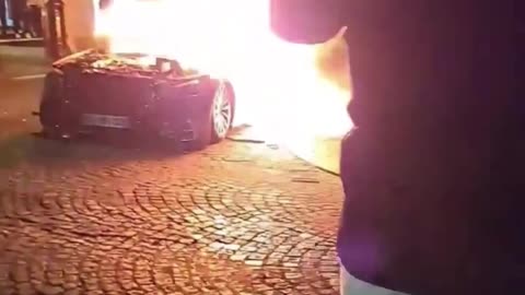 PSG fans, many North Africans, devastate Paris after victory over Arsenal.