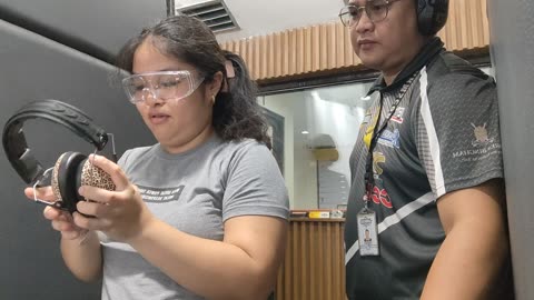 Bullet Casing Lands Inside Protective Glasses