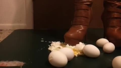 Brown High Heel Boots vs. Eggs