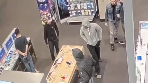 Best Buy Employees Lined Up in Cover 3 Defense to Stop Shoplifters from Stealing Phones and Tablets
