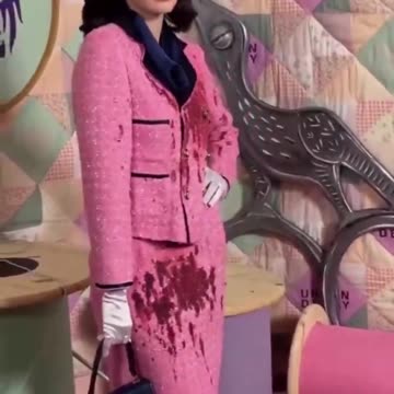 Julia Fox wearing a blood soaked Halloween costume of JFK’s wife.