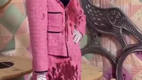 Julia Fox wearing a blood soaked Halloween costume of JFK’s wife.