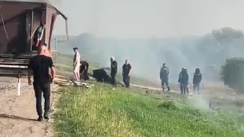 Russian Civilians Enter Burning Trailer Previously Seen Launching Dozens