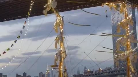 Evening Views of the Brooklyn Bridge and a Majestic Ship
