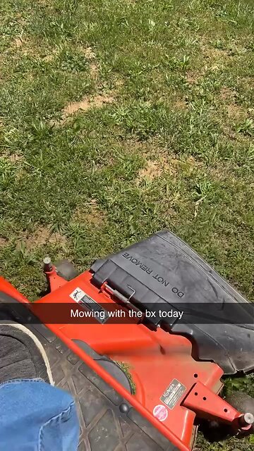 Bx2380 mowing the yard