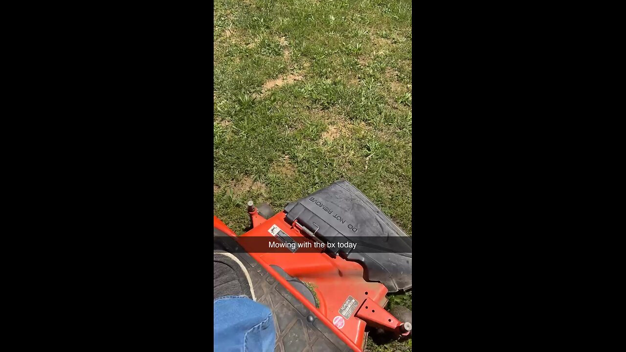 Bx2380 mowing the yard