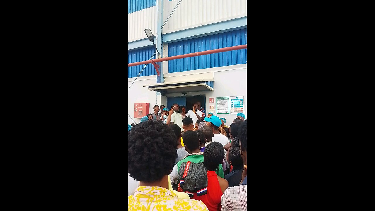 indian man assaulting workers in Nigerian