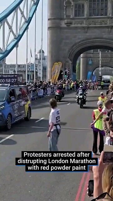 Youth Demand Disrupts London Marathon with Red Powder Protest at Tower Bridge.
