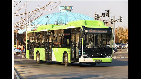 Tashkent, Uzbekistan - February 14, 2025: Green urban bus Yutong ZK6126HG in the city street.