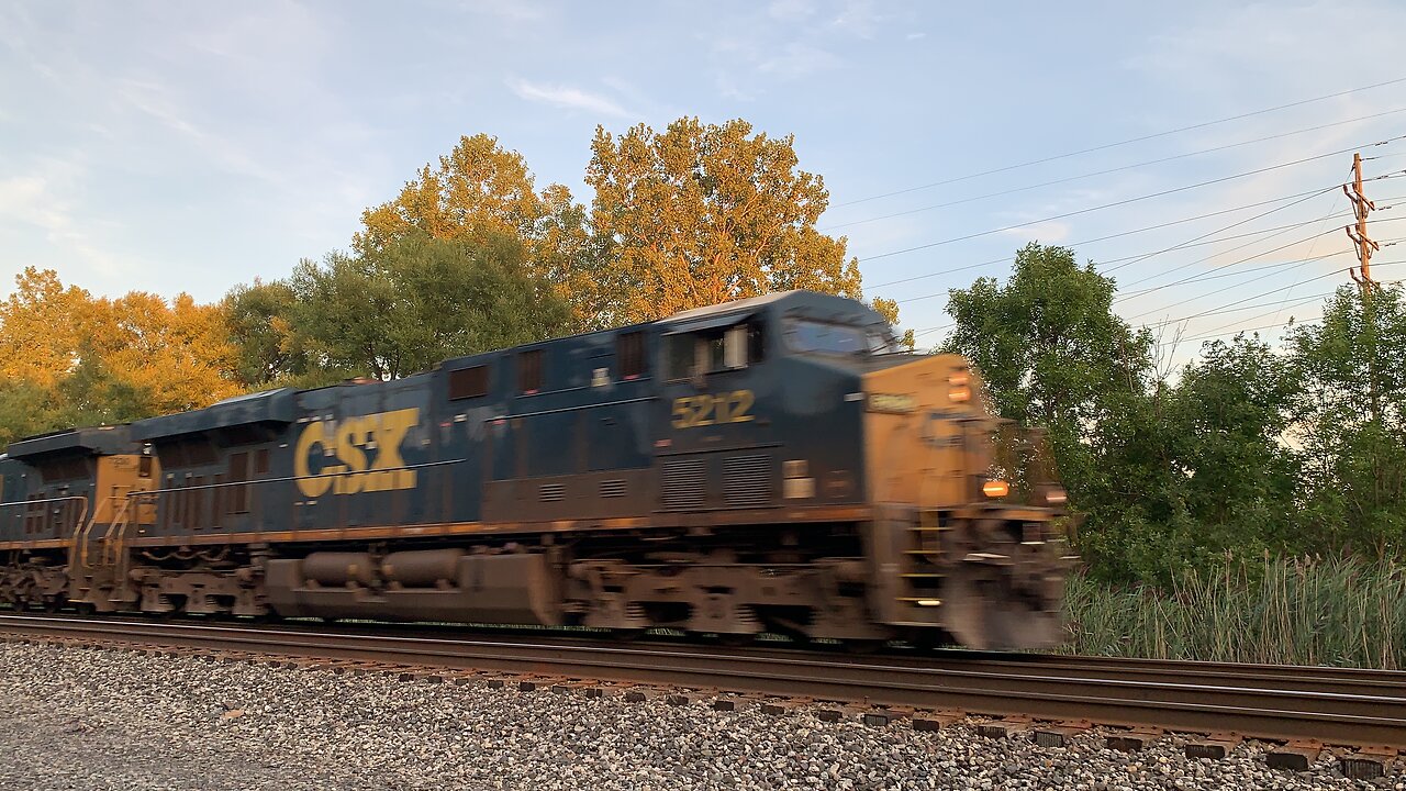 CSX Trains 5212 and 7230 head to the yard quickly