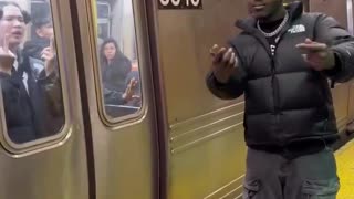 TNB in NYC Subway - stealing phone from innocent Japanese passenger and gloating